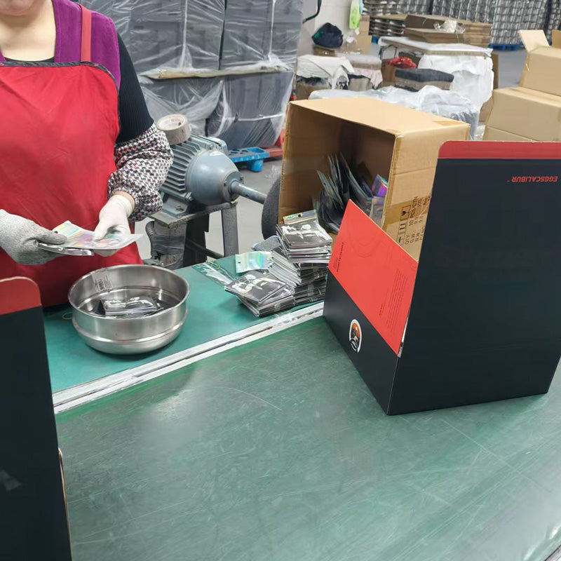 Eggscalibur pan close-up — sword handle craftsmanship detail